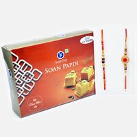 Elegant Rudraksha and Golden Ruby Rakhi Set with Authentic Kanha Soan Papdi