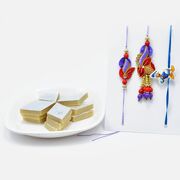 Bhaiya-Bhabhi Zardozi Rakhi and Donald Duck Kids Rakhi with Heavenly Kaju Katli