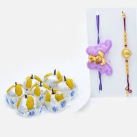 Ganesha Engraved Rakhi and Kids Rakhi Set of 2 with Tasty Kaju Badam Laddu