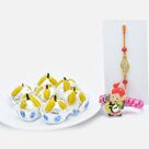 Ganesha with Damru and Simple Rakhi Set of 2 with Kaju Badam Laddu