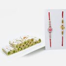 Auspicious Rakhi Set of 2 with Tasty Kaju Pista Roll
