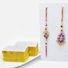 Magnificient Bhaiya-Bhabhi Rakhi Set with Kaju Kesar Sweet