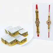 Beatiful Golden Rakhi Set of 2 with Pista Badam Barfi