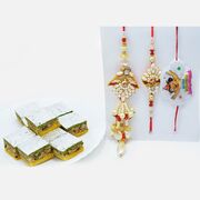 Beads and Pearls Bhaiya-Bhabhi Rakhi and Chhota Bheem Kids Rakhi with Tempting Pista Badam Barfi
