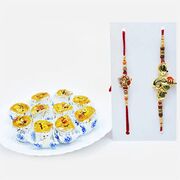 Golden Gajanan and Elegant Rakhi Set of 2 with Savory Kaju Honey Dew