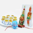 Heavy Worked Bhaiya-Bhabhi Rakhi Set with Doraemon Kids Rakhi and Fresh Kaju Honey Dew