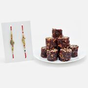 Exquisite AD Work Rakhi Set of 2 with Tempting Kanha Khajoor Dryfruit