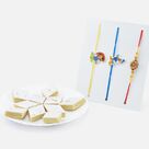 Donald Duck and Mickey Mouse Kids Rakhi with Om Auspicious Bhai Rakhi and Kaju Katli Sweet