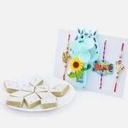 Two Toy and Cartoon Kids Rakhis with Auspicious Brother Rakhis and Kaju Katli Delicious Sweet