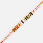 Simply Elegant Looking Pearl and Twin Color Diamond Thread Rakhi