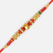 Golden Cutting Bead with Gems and Diamond Rakhi