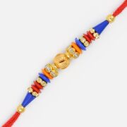 Amazing Central Golden Ball with Gems Thread Rakhi