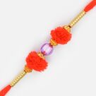 Central Red Bead Golden Design Thread Rakhi