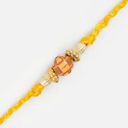 Wooden Brown Shaded Ball with Yellow Thread Rakhi