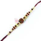 An Impressive Creation - Thread Rakhi with Golden Beads and Rudraksha